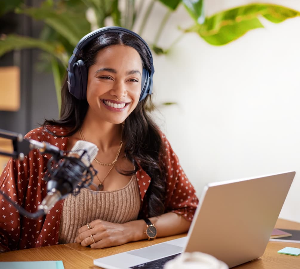 Smiling woman with the laptop